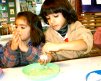 Luego se agrega coco rallado... y dulces de colores cocadas
